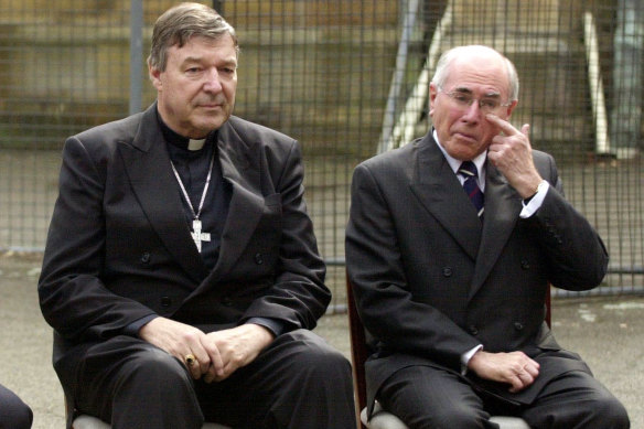 George Pell and John Howard in 2004. The former prime minister provided a character reference for Pell.