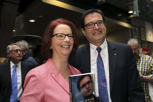 Combet with former prime minister Julia Gillard in 2014 at the launch of his book, The Fights of My Life.