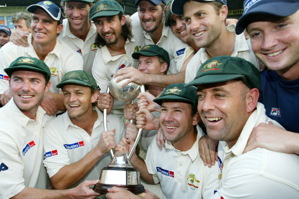 Australia pose with the Border-Gavaskar trophy after winning the Test series against India in 2004.