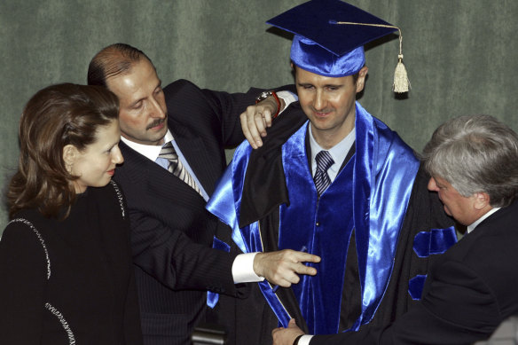 Bashar al-Assad (second right) was awarded an honorary doctorate in Moscow in 2005.  
