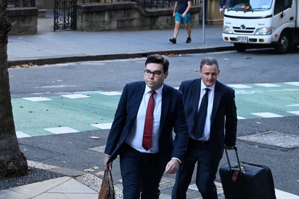 Bruce Lehrmann (left) arrives at the Federal Court in Sydney on Thursday.