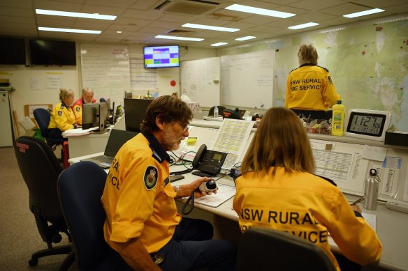 NSW RFS volunteers working in the operations room at the Eurobodalla operations fire control centre.