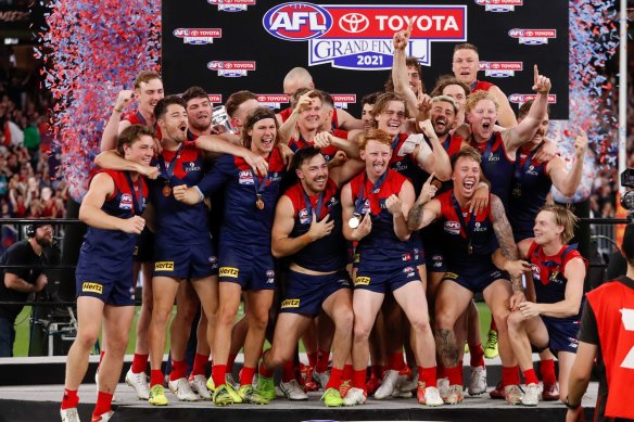 The Demons celebrate their grand final win in Perth last year.