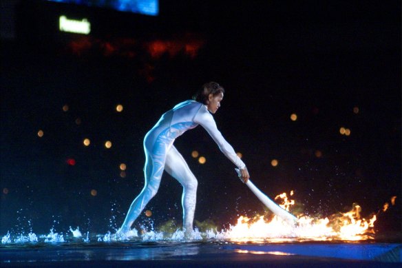 Cathy Freeman ignites the flame during the opening ceremony of the Sydney Olympics.