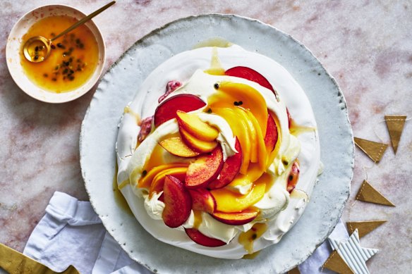 Look for colourful, perfumed fruit to make Adam Liaw’s mango and peach pavlova.