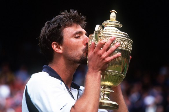 Memorable: Goran Ivanisevic celebrates after defeating Pat Rafter in the 2001 Wimbledon final.
