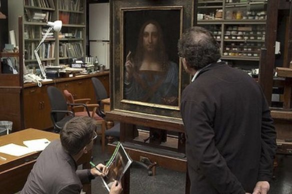 Robert Simon inspects the Salvator Mundi at the National Gallery in 2011.