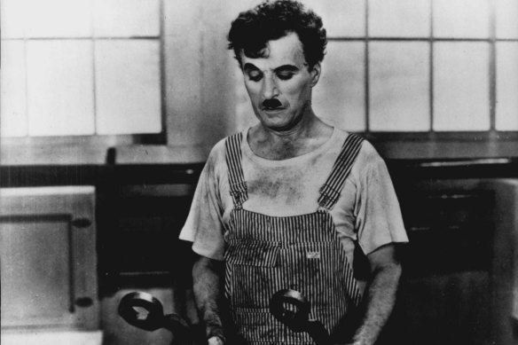 Charlie Chaplin in a scene from the 1936 film ‘Modern Times’.