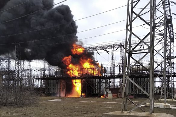 Flames and smoke rise from the thermal power plant, which, according to local authorities, was damaged by shelling, near the frontline in the town of Shchastia in the Luhansk region, Ukraine on Tuesday.