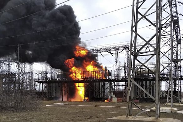 Flames and smoke rise from the thermal power plant, which, according to local authorities, was damaged by shelling, near the frontline in the town of Shchastia in the Luhansk region, Ukraine on Tuesday.