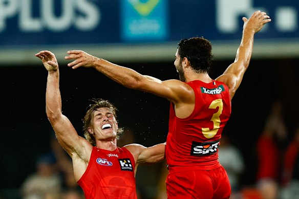 Christian Petracca celebrates a goal as part of his brilliant performance in his first match for the Suns.