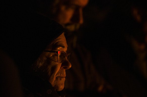 Rosyln Devlin pays her respects at the dawn service in Melbourne. 