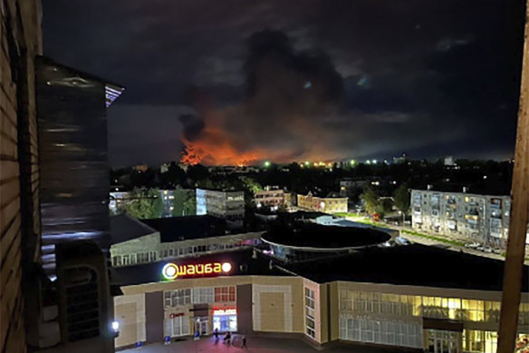 Smoke billowing over the city and a large blaze in Pskov, Russia, on August 29.