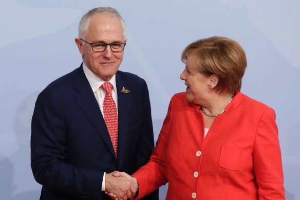 Australian prime minister Malcolm Turnbull and German Chancellor Angela Merkel agreed in 2017 at the G7 leaders' summit to back an energy transition hub that is now facing an uncertain future after both nations ended their support.