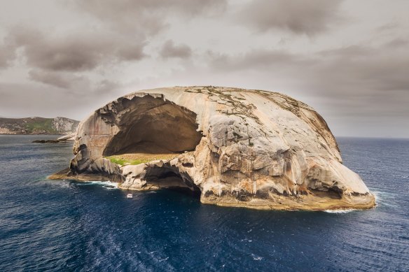 Where will you find the island, also known as Skull Rock?