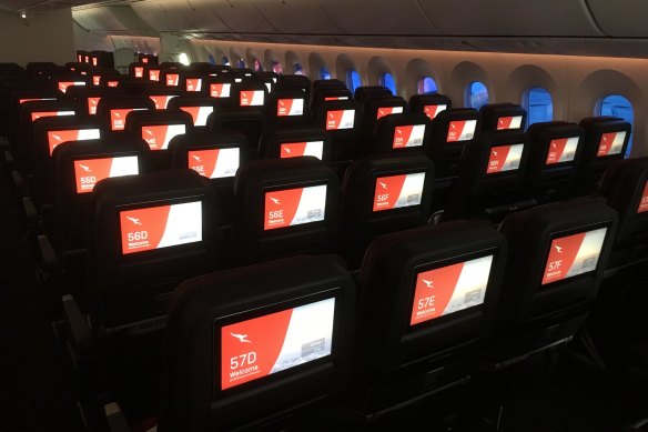 The lights are dimmed after take-off despite this being a daytime flight. 
