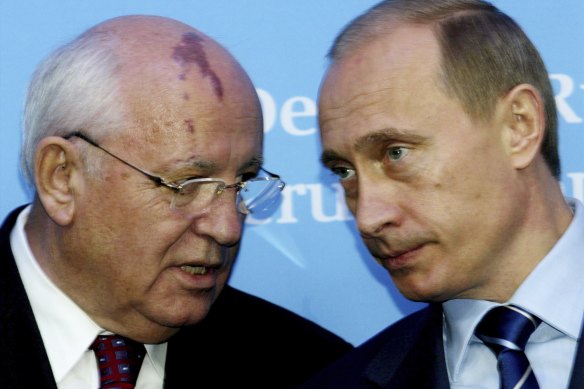 Russia’s President Vladimir Putin, right, talks with former Soviet President Mikhail Gorbachev at the Castle of Gottorf in Schleswig, northern Germany, 2004.