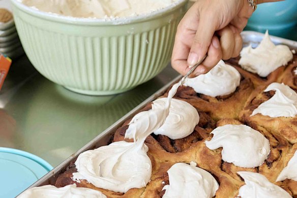 Preparing cinnamon buns with maple whipped cream at Ard, Stanmore.