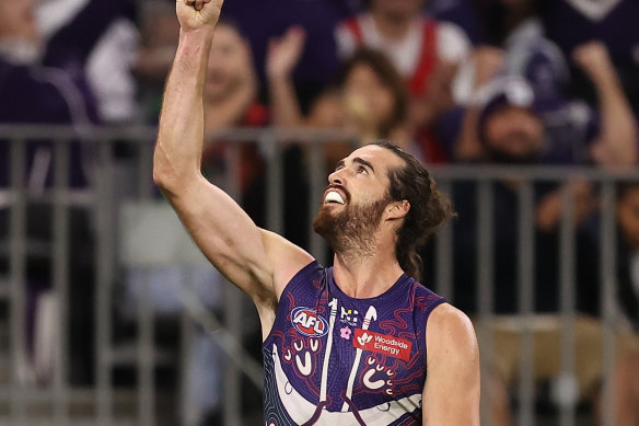 Alex Pearce points to the sky after kicking the clutch goal against the Magpies.