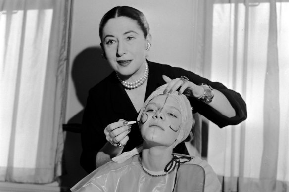 Beauty expert Helena Rubinstein in 1935, after conquering Australia, London and New York, illustrating the shape of the basic lines on the face so that make-up can be applied to flatter individual contours.
