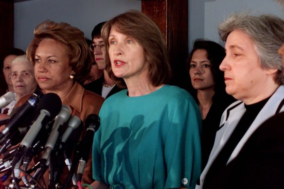 National Organization for Women President Patricia Ireland, center, flanked by Dr. Jane Smith, president of the National Council of Negro Women, left, and Eleanor Smeal, president of the Feminists Majority, meet reporters to demand the Republican Congress to drop efforts to impeach President Clinton. 