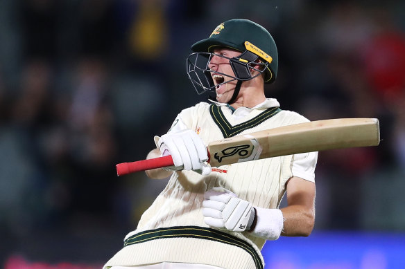 Count them: Marnus Labuschagne celebrates his century during day one of the second Test. 