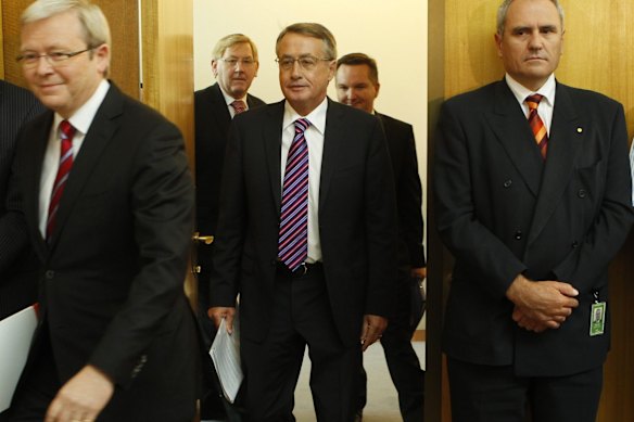 Then-also Secretherary Ken Henry (Right), Prime Minister Kevin Rudd and Treasure Wayne Swan in 2010. 