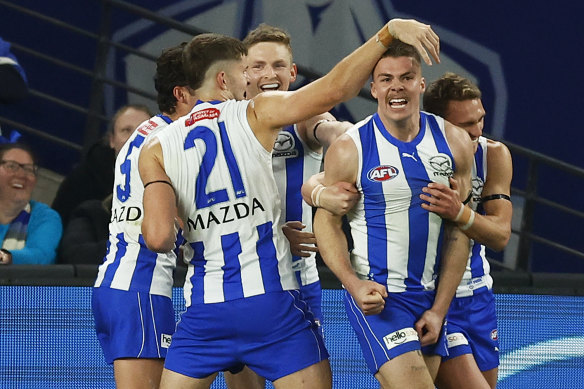 Cameron Zurhaar (second right) celebrates the match winner against Richmond.