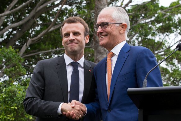Malcolm Turnbull, right, and Emmanuel Macron, pictured in 2018, kept in touch after Turnbull left office. 
