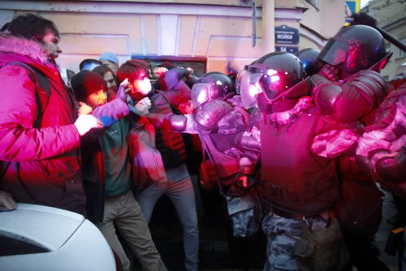 People clash with police during a 2021 protest in support of jailed opposition leader Alexei Navalny in St Petersburg, Russia.