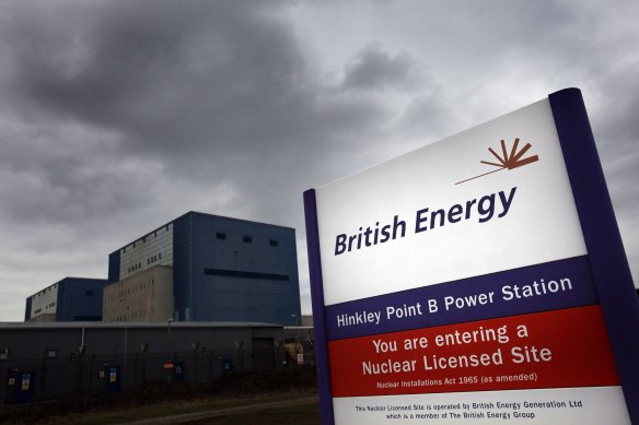 A British Energy sign is displayed in front of a nuclear power station on  near Bridgwater, England. 
