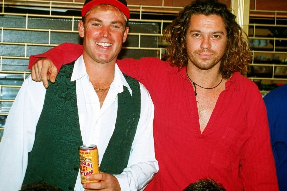 Shane Warne with Michael Hutchence, lead singer of INXS in England in 1993.