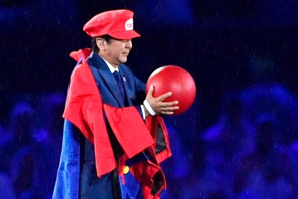 Shinzo Abe appears as the Nintendo game character Super Mario during the closing ceremony at the 2016 Summer Olympics in Rio de Janeiro.