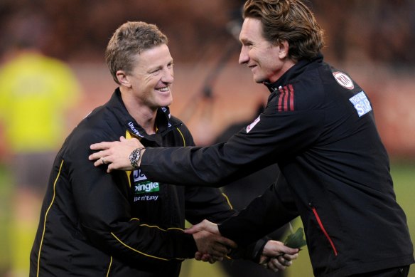 James Hird (right) and Damien Hardwick in 2013. The pair were premiership teammates and later opposing coaches.