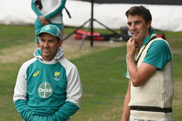 Justin Langer and Pat Cummins in Hobart last month.