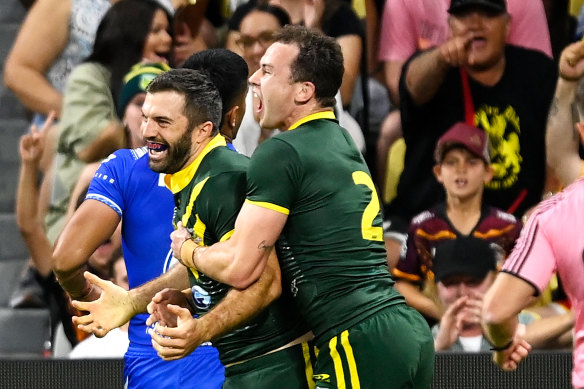 James Tedesco and Dyland Edwards celebrate.