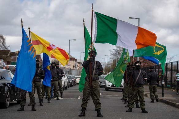Members of a dissident republican nationalist group hold a rally in Derry on Monday.