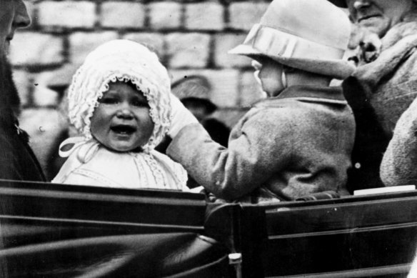 Queen Elizabeth II (left) in 1927 when she was Princess Elizabeth, aged one year.