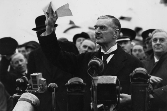 British prime minister Neville Chamberlain returns from his meeting with Hitler in Munich in 1938.