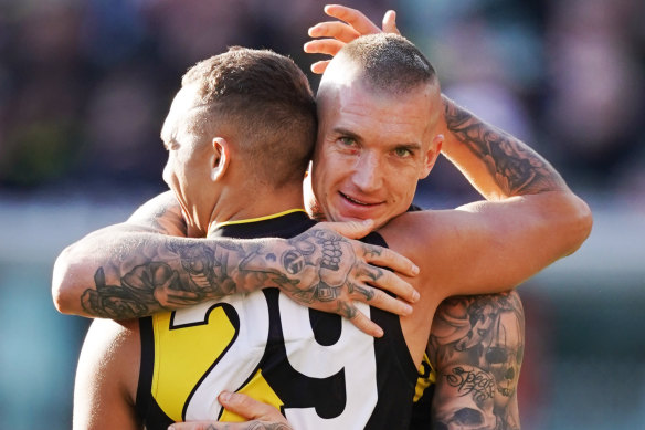 Tigers' favourite son, Dustin Martin, celebrates Shai Bolton's goal during their 2019 grand final mauling of the Giants. 
