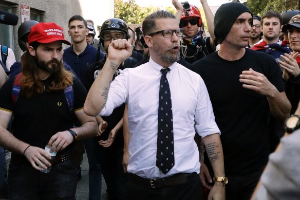 Proud Boys founder Gavin McInnes (centre).