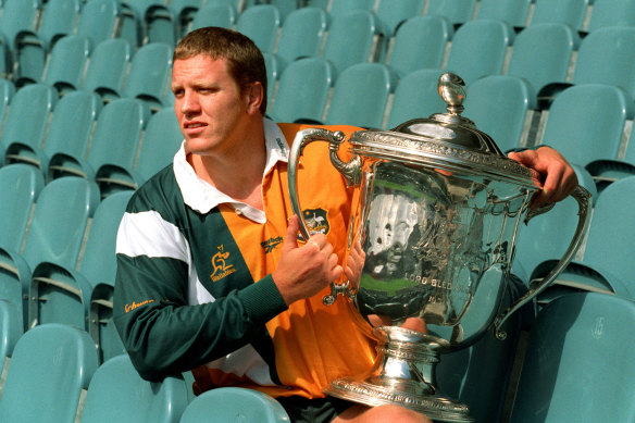 Garrick Morgan holding the Bledisloe Cup in 1997.