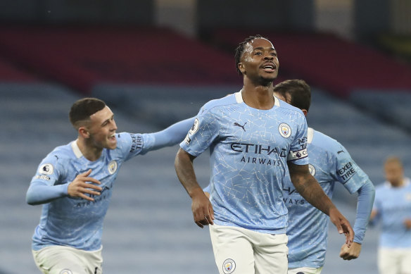 Raheem Sterling celebrates his goal, which would prove the difference against Arsenal.