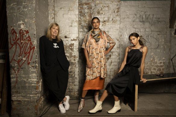 Ngali founder Denni Francisco with models Samantha Harris and Latahlia Hickling ahead of the First First Nations solo Indigenous Fashion Show. Carriagework, Eveleigh. May 17, 2023. 