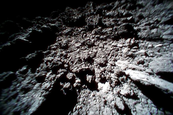 This September 23, 2018 image,  captured by Rover-1B and provided by the Japan Aerospace Exploration Agency, shows the surface of ‘Ryugu’, an asteroid similar to ‘Brisbane.’