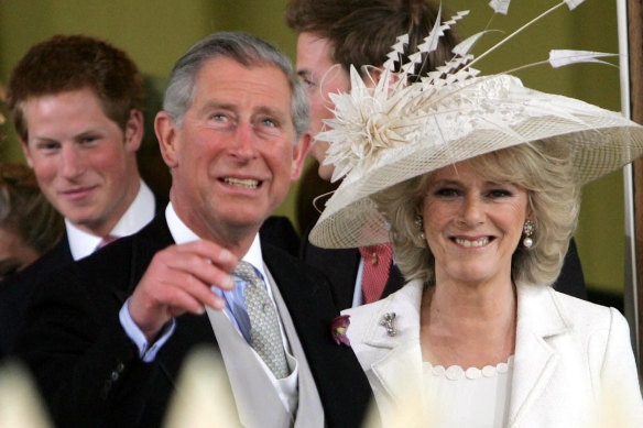 Prince Harrry writes that he lived with his father Charles and stepmother Camilla before moving out.