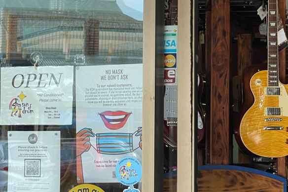 Several shops in Mullumbimby have “No Mask, We Don’t Ask” signs in their windows.