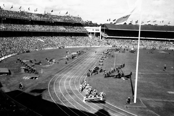 A crowd of nearly 90,000 watches the Olympic 3,000 metres steeplechase at the M.C.G. on 27 November 1956. 