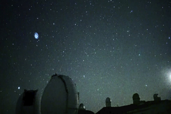 A spiral swirling through the night sky from Mauna Kea, Hawaii’s tallest mountain.