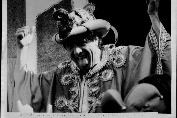 Moomba King Molly Meldrum wearing his special hat/crown on the float as it shakes its way down Swanston Street at the head of the parade on March 11, 1985.